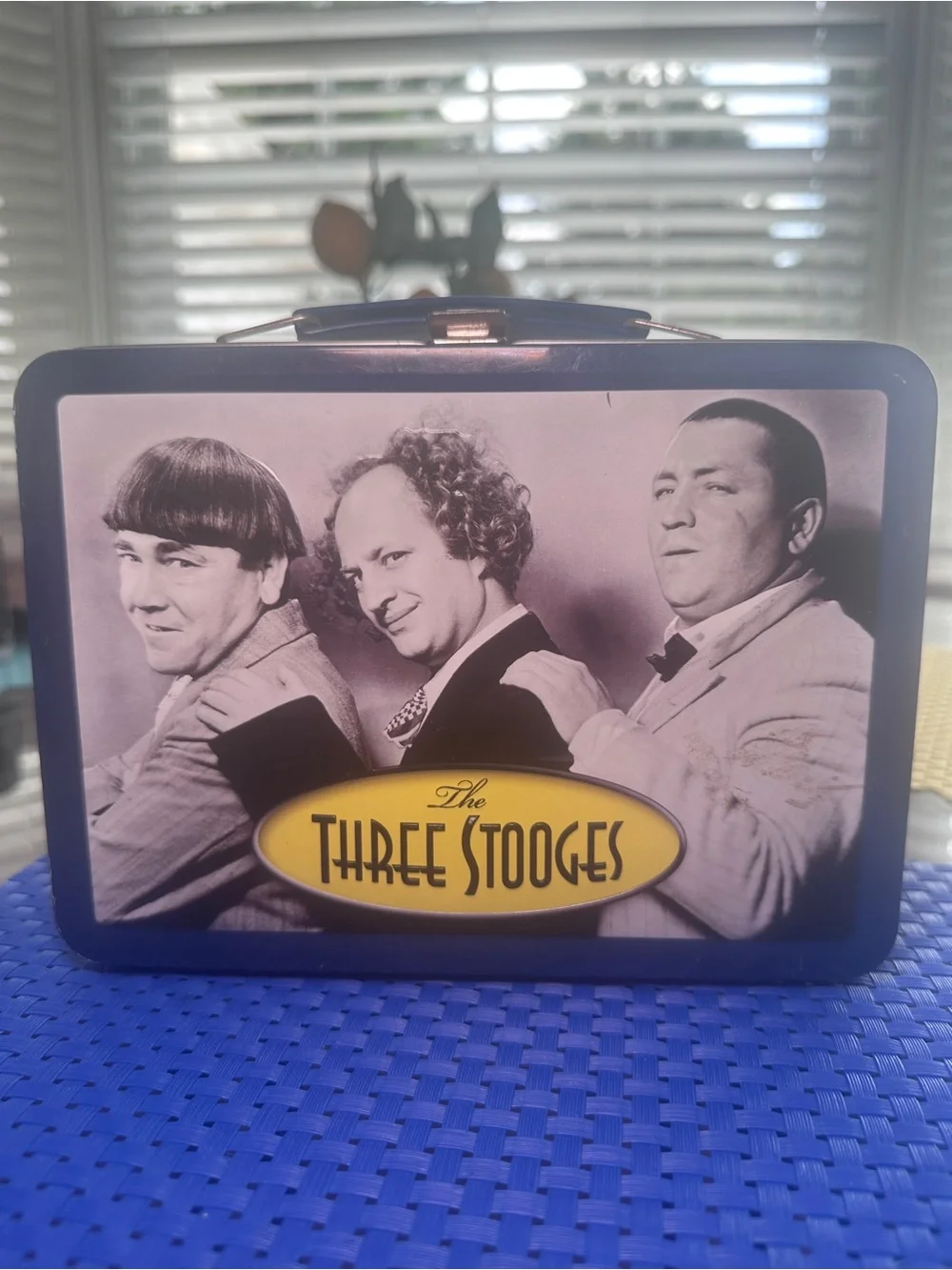 Vintage-style Blue Metal Lunchbox with Classic Comedy Artwork